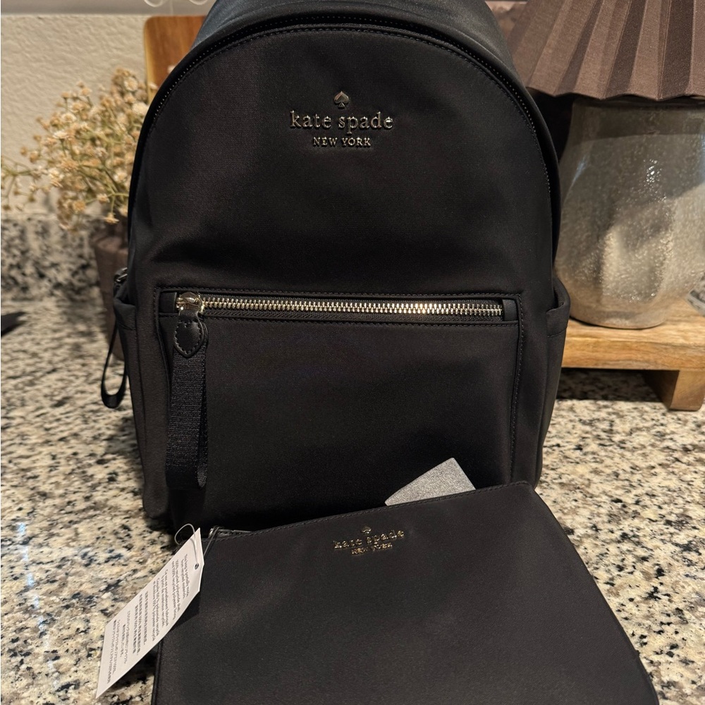 kate spade medium black nylon Backpack with pouch.
